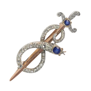 Antique gold diamond and sapphire brooch snake wrapped around sword or dagger